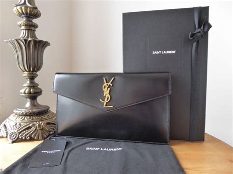 ysl black uptown pouch|ysl uptown pouch with chain.